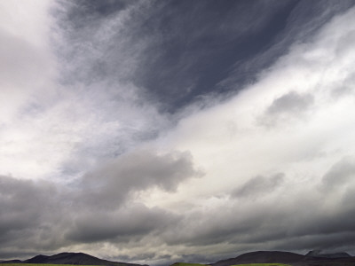 Clouds Over A Mountain Range, Iceland by Atli Mar Pricing Limited Edition Print image