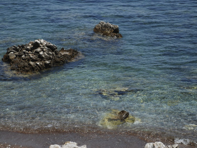 Sea And Rocks by Fatih Donmez Pricing Limited Edition Print image
