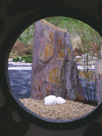 Momotaro (Japanese) Garden - View Through Moon Gate To Large Rock Focal Point by Clive Nichols Pricing Limited Edition Print image