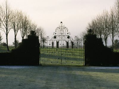 Ornate Metal Gates At Eastleach House, Gloucestershire by Clive Nichols Pricing Limited Edition Print image