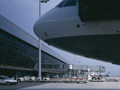 Kansai Airport, Osaka, Exterior With Airplane In Fore, Architect: Renzo Piano Building Workshop by John Edward Linden Pricing Limited Edition Print image