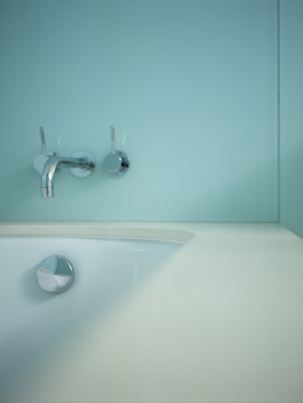 Modern Chrome Bath Mixer Tap By 'Vola' On A Green Wall At The End Of A Bath With Chrome Overflow by Richard Powers Pricing Limited Edition Print image