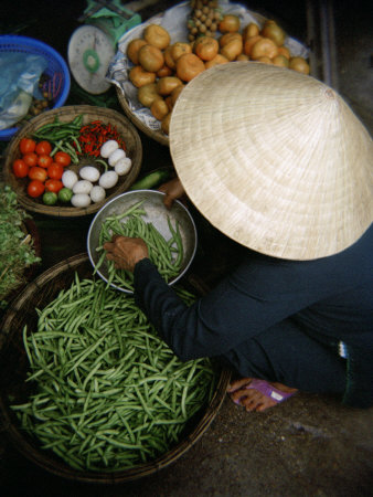 Vegetable Seller Selling Her Goods In A Wet Market In Vietnam by Eightfish Pricing Limited Edition Print image