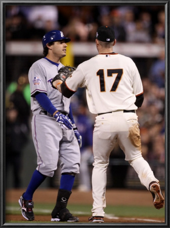 Texas Rangers V San Francisco Giants, Game 1: Aubrey Huff, Ian Kinsler by Ezra Shaw Pricing Limited Edition Print image