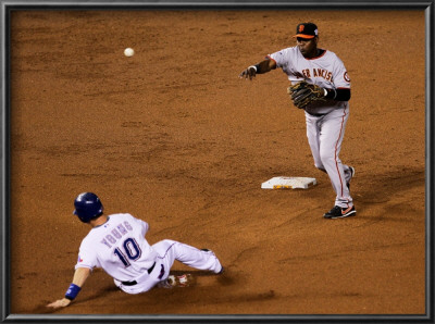 San Francisco Giants V Texas Rangers, Game 4: Edgar Renteria,Michael Young by Stephen Dunn Pricing Limited Edition Print image