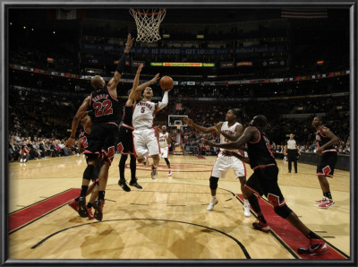 Chicago Bulls V Toronto Raptors: Jerryd Bayless And Taj Gibson by Ron Turenne Pricing Limited Edition Print image