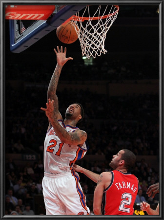 New Jersey Nets V New York Knicks: Wilson Chandler And Jordan Farmer by Nick Laham Pricing Limited Edition Print image