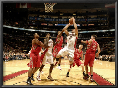 Houston Rockets V Toronto Raptors: Linas Kleiza And Brad Miller by Ron Turenne Pricing Limited Edition Print image