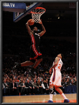 Miami Heat V New York Knicks: Lebron James And Wilson Chandler by Al Bello Pricing Limited Edition Print image