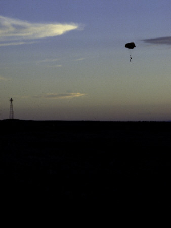 Skydiver Landing At Sunset, Usa by Michael Brown Pricing Limited Edition Print image