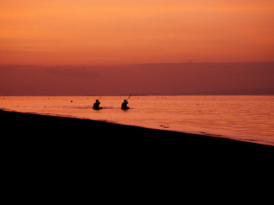Kayaking Into The Sunset, Indonesia by Michael Brown Pricing Limited Edition Print image