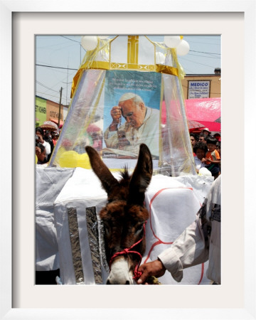 The Residents Of Otuma, Mexico Decorate A Donkey With A Popemobile by Marco Ugarte Pricing Limited Edition Print image