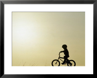 Silhouette Of Boy Riding A Bicycle by Fred Luhman Pricing Limited Edition Print image