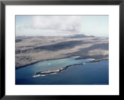 Santa Fe Island With Boat In The Bay, Galapagos Islands by Mary Plage Pricing Limited Edition Print image