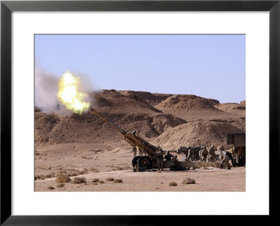 Searing Flame And Smoke Emerge From The Muzzle Of An M198 Howitzer by Stocktrek Images Pricing Limited Edition Print image