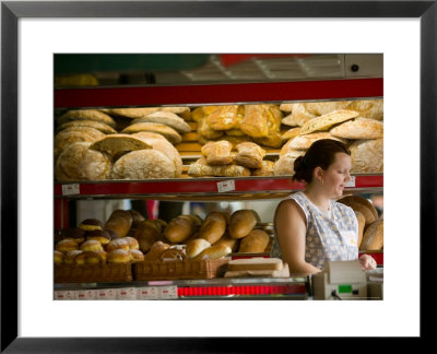 Woman In Bakery, Trogir, Croatia by Russell Young Pricing Limited Edition Print image