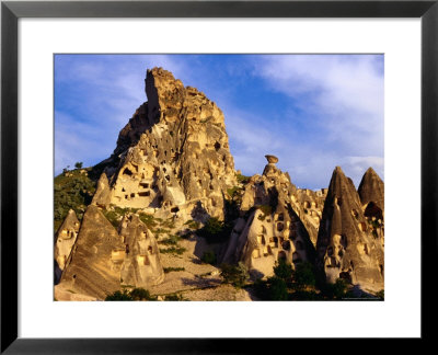 Honeycombed Network Of Tunnels Carved Into Volcanic Rock Of The Kale, Uchisar, Nevsehir, Turkey by Diana Mayfield Pricing Limited Edition Print image