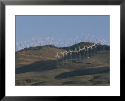 Rows Of Spinning Wind Turbines Generate Electricity by Marc Moritsch Pricing Limited Edition Print image