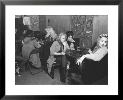 Girlfriends Of Hell's Angels Members Sitting Away From Hell's Angels In Separate Part Of The Bar by Bill Ray Pricing Limited Edition Print image