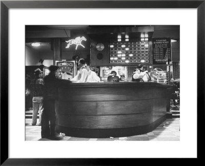 Men Placing Bets On Horses At The Casino Counter by Ralph Morse Pricing Limited Edition Print image