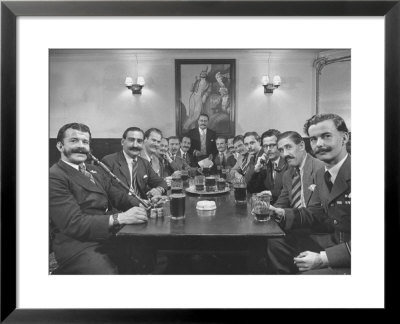 Members Of Handlebar Club Sitting At Table And Having Formal Beer Session by Nat Farbman Pricing Limited Edition Print image