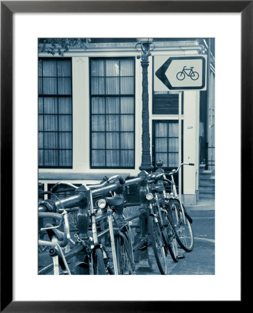 Holland, Amsterdam, Bicycle Sign And Traditional Amsterdam Houses by Gavin Hellier Pricing Limited Edition Print image
