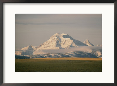 Early Snow Covers The Mountains Of Glacier National Park by Dick Durrance Pricing Limited Edition Print image