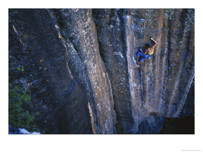 A Young Woman Climbs A Wall In Moab, Utah by Jimmy Chin Pricing Limited Edition Print image