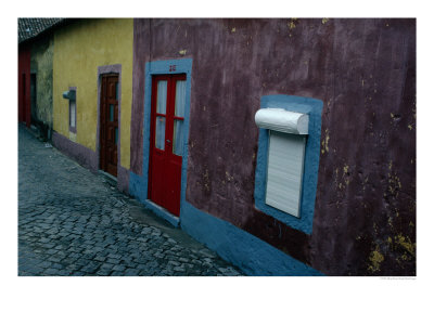 Small Painted Houses And Cobblestone Streets Of Vila Do Condo, Vila Do Conde, Douro, Portugal by Jeffrey Becom Pricing Limited Edition Print image