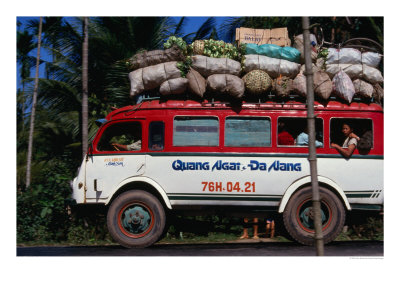 Bus Carrying Load And Passengers, Vietnam by John Borthwick Pricing Limited Edition Print image