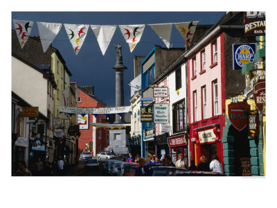 Street Decorated With Buntings And Signs, Ennis, Ireland by Wayne Walton Pricing Limited Edition Print image