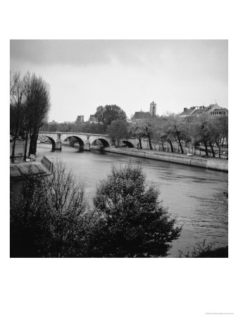 Seine River And Bridge Near Isle Saint Louis, France by Eric Kamp Pricing Limited Edition Print image
