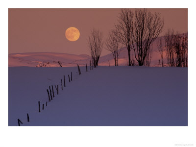 Wooden Fence In Snow Covered Field At Sunset by John Connell Pricing Limited Edition Print image