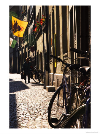 Bikes Parked In Historic Laneway, Bern, Switzerland by Glenn Beanland Pricing Limited Edition Print image