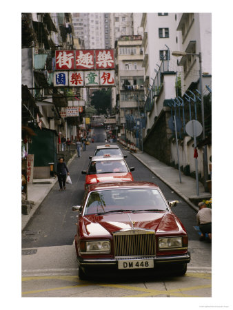 One Of Hong Kongs Many Rolls Royce Cars In Central by Eightfish Pricing Limited Edition Print image