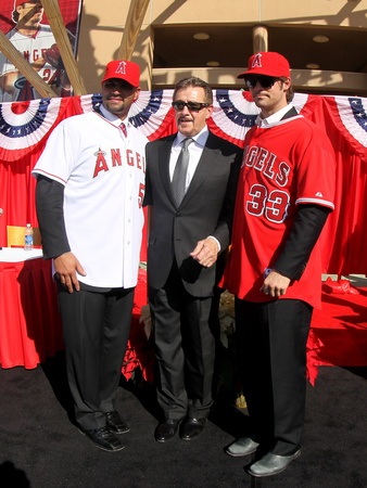 Los Angeles Angels Of Anaheim, Ca - December 10: Arturo Moreno, Albert Pujols And C.J. Wilson by Stephen Dunn Pricing Limited Edition Print image