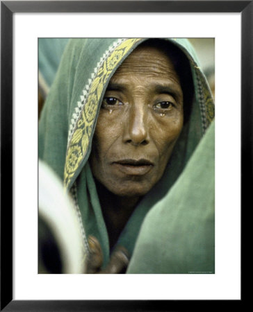 East Pakistani Looking Forlorn While Waiting For Rations From British Troops After Cyclone Disaster by Larry Burrows Pricing Limited Edition Print image