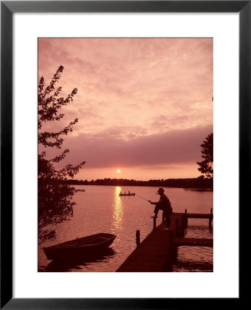 Fishing And Rowing At Sunset On A Pond In The United States by Alfred Eisenstaedt Pricing Limited Edition Print image