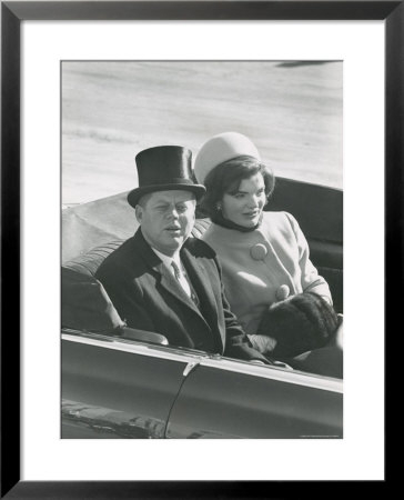President John F. Kennedy With Wife Jacqueline Riding In Convertible Following His Inauguration by Paul Schutzer Pricing Limited Edition Print image