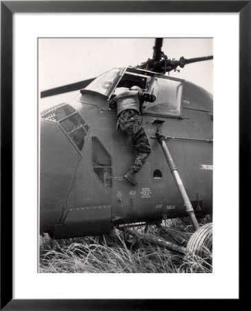 Lance Cpl. James C. Farley Attempting To Rescue Pilot From Cockpit Of Downed Yp3 by Larry Burrows Pricing Limited Edition Print image