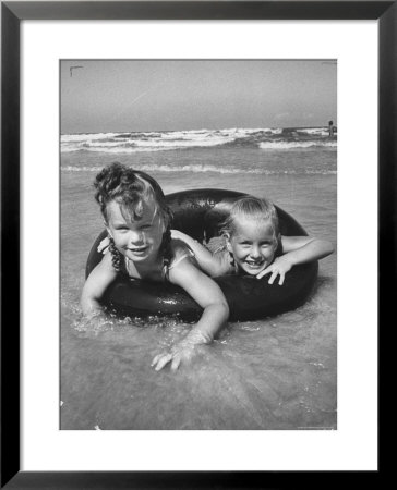 Little Girls Playing Together On A Beach by Lisa Larsen Pricing Limited Edition Print image