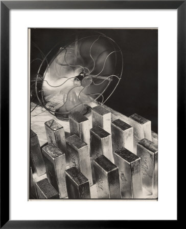 Newly Molded Gold Bars Being Cooled By Fan In The Us Assay Office by Margaret Bourke-White Pricing Limited Edition Print image