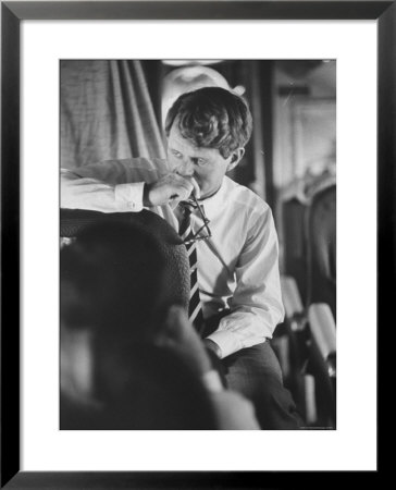 Senator Robert F. Kennedy Aboard Plane During Trip To Help Local Candidates by Bill Eppridge Pricing Limited Edition Print image