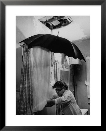 Tenement Dweller Struggling In Her Dilapidated Bathroom by Truman Moore Pricing Limited Edition Print image