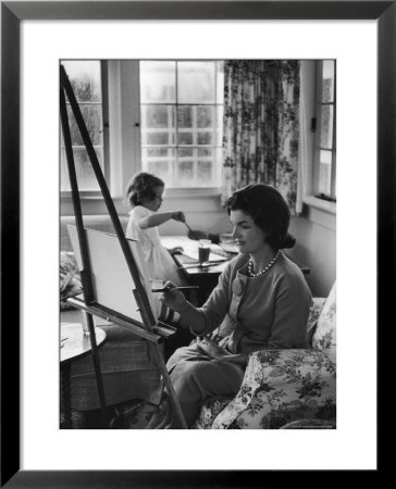 Jackie Kennedy, Wife Of Sen, Painting On An Easel As Daughter Caroline Paints On Table At Home by Alfred Eisenstaedt Pricing Limited Edition Print image