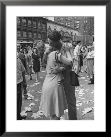 Man Kissing Girl In The Midst Of Confetti Strewn Street Near The Latin Quarter Nightclub by Alfred Eisenstaedt Pricing Limited Edition Print image