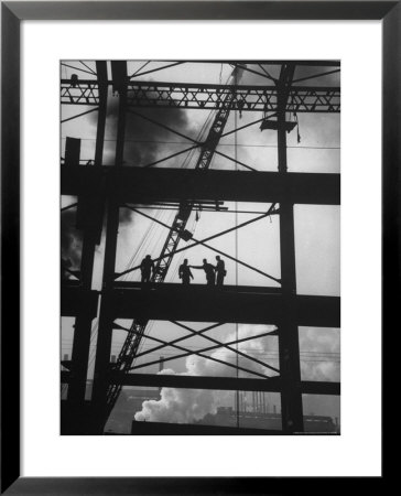 Workmen Against Smokey Sky As They Stand On Girders Of The New Carnegie Illinois Steel Plant by Margaret Bourke-White Pricing Limited Edition Print image