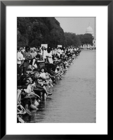 People At Civil Rights Rally Soaking Their Feet In The Reflecting Pool At The Washington Monument by John Dominis Pricing Limited Edition Print image