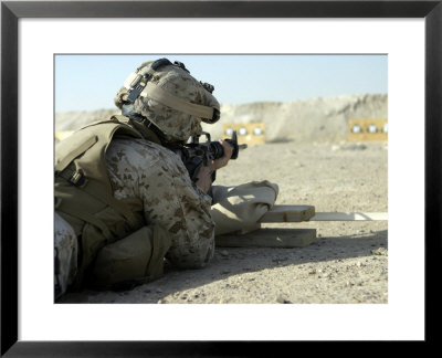 A Corpsman Fires His M16a2 Service Rifle To Acquire A Battle Sight Zero by Stocktrek Images Pricing Limited Edition Print image