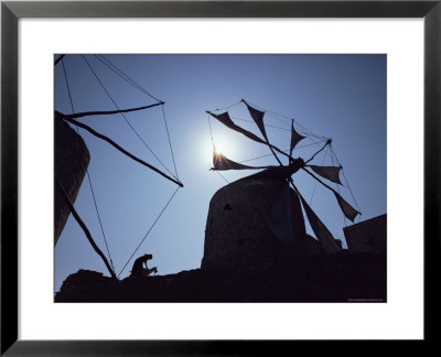 Woman And Goat Under Sail Driven Windmills, Olimbos, Karpathos, Greece by David Beatty Pricing Limited Edition Print image
